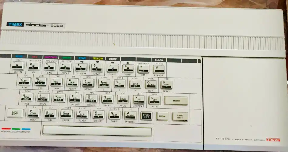 My Timex Sinclair 2068. Look at the keys. Every one of them has three or four legends printed on it for the different shift modes. PRINT lives on the P key, OR lives on the U key, GO TO is on G, and so on. That is what BASIC entry looks like on this machine.