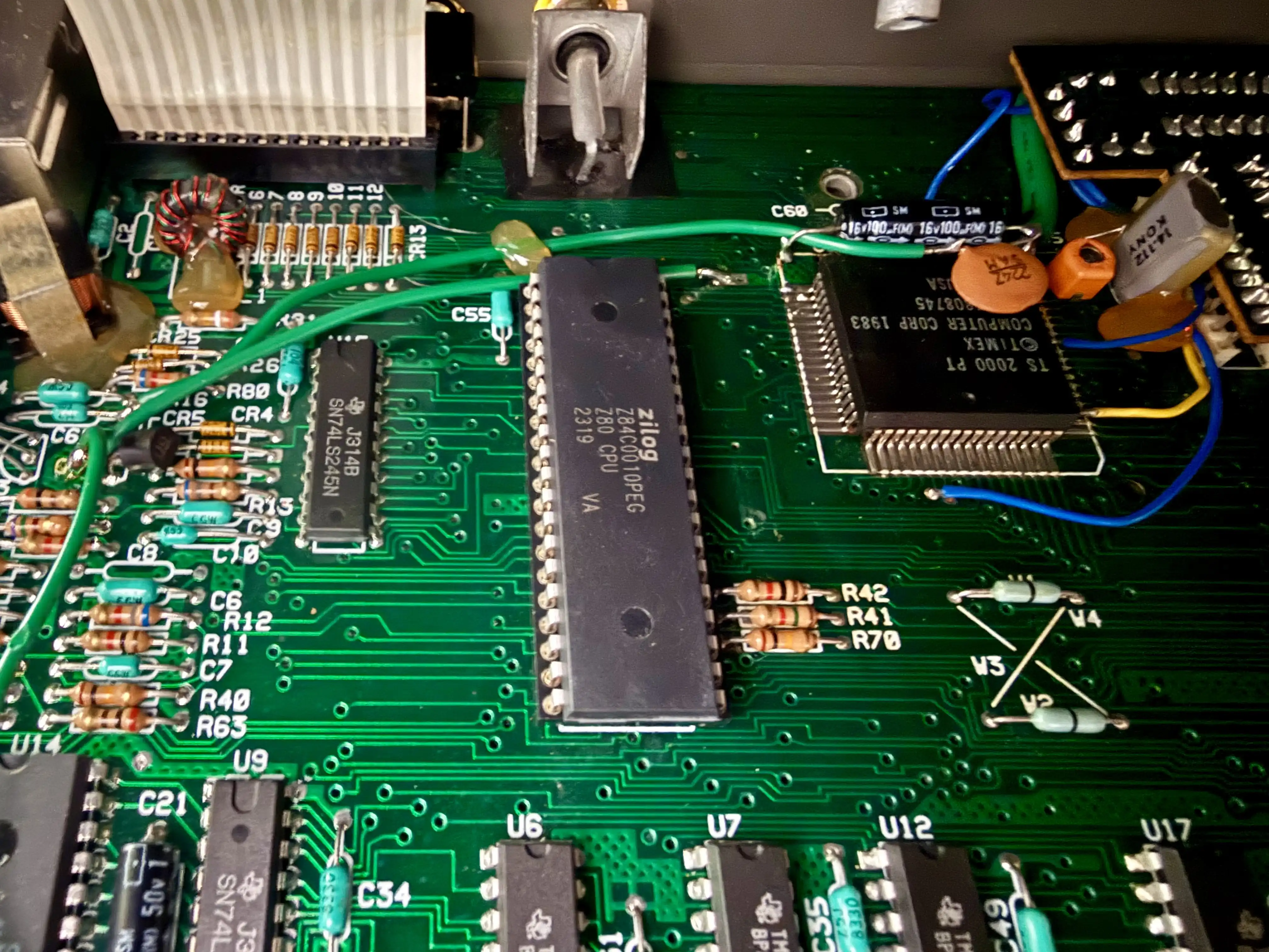The new Z84C0010PEG, a CMOS Z80 rated to 10 MHz, date code 2319. Original 1983 board, 2023 CPU, no lifted pads, fresh socket, so this part is removable from now on. The big black square to the right is the Timex SCLD.